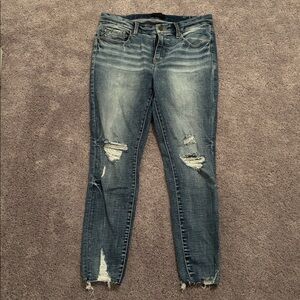 Distressed Blue Jeans